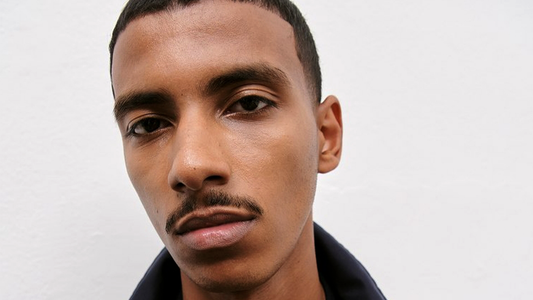 𝐌𝐨𝐡𝐚𝐦𝐞𝐝 𝐇𝐚𝐬𝐬𝐚𝐧: From Amsterdam Discovery to Fashion Week Mainstay